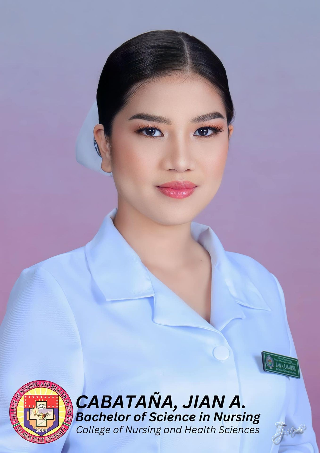 Graduation photo of a nursing student wearing a white uniform against a purple background.